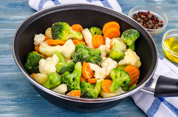 istock Pan with frozen vegetable mix for frying 1090105550