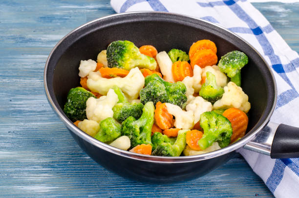 istock Pan with frozen vegetable mix for frying 1090105560