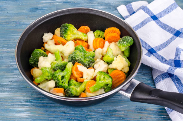 istock Pan with frozen vegetable mix for frying 1090105570