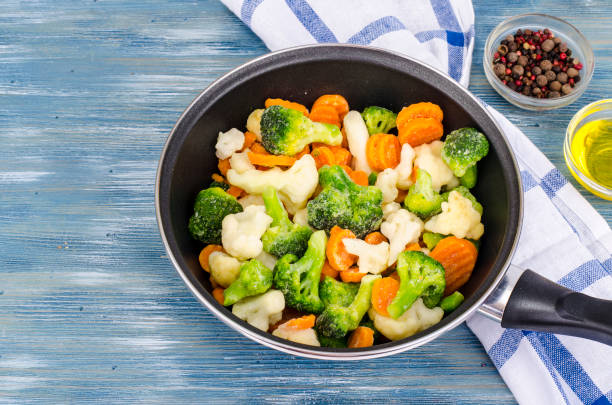 istock Pan with frozen vegetable mix for frying 1090105638