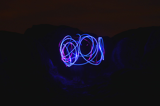 Light painting lines taken at night. Ball of scribble lines.