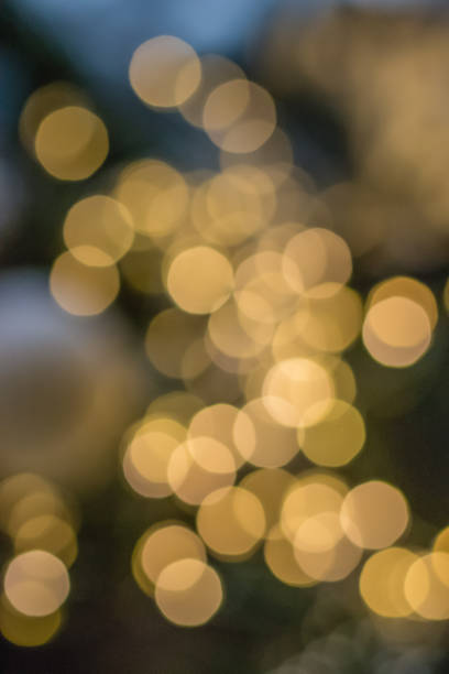 istock Blurred bokeh background texture. warm white garland lights. 1090110832