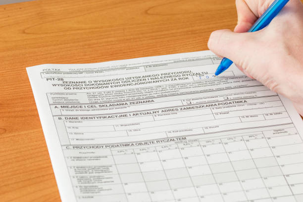 istock Filling polish peper tax form PIT-28. 1090111982