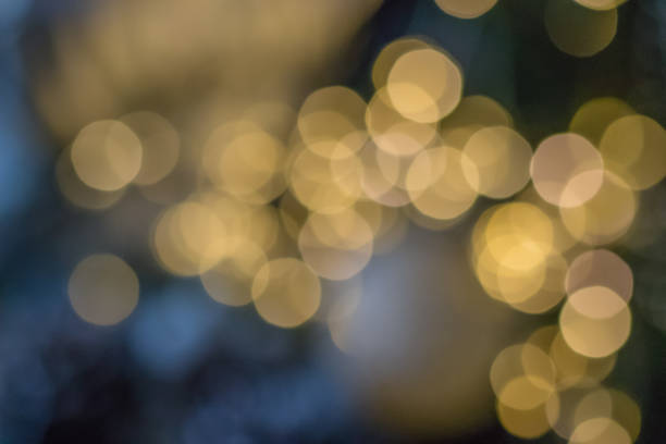 istock Blurred bokeh background texture. warm white garland lights. 1090112762