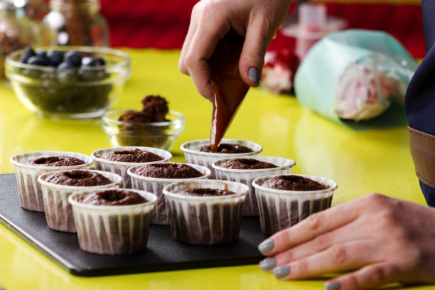 istock Close up of decorating cupcakes 1090126826