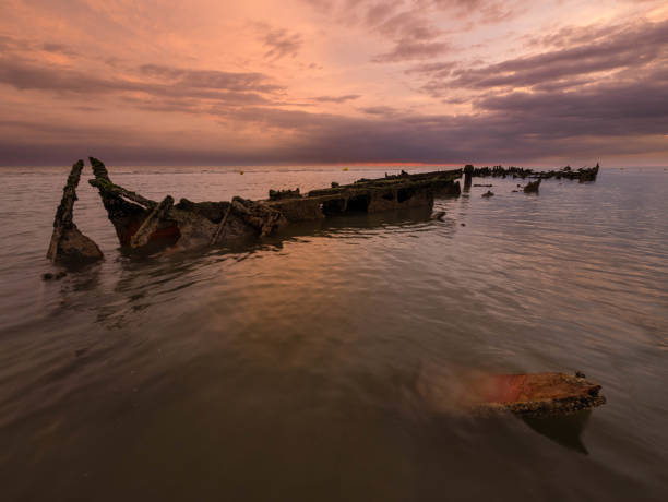 istock Sun rising above a shipwreck from World War II 1090127340