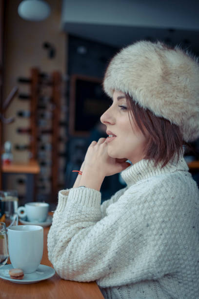 istock Beautiful young woman in cafe 1090134518