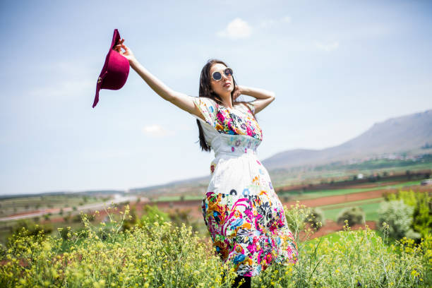 istock female model photography between flowers 1090138700