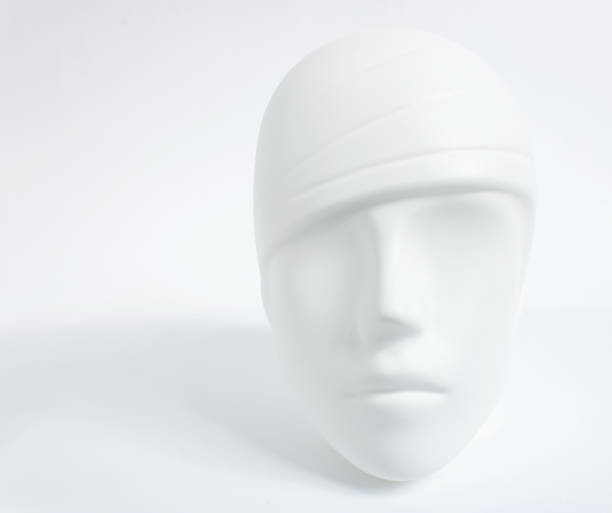 istock White plastic human head from mannequin as soft object with shadows, shades of gray, mild style concept, on white 1090143282