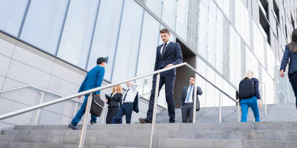 istock Business People Walking Toward Steps Outdoors 1090145210