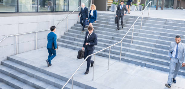istock Business People Walking Toward Steps Outdoors 1090145296