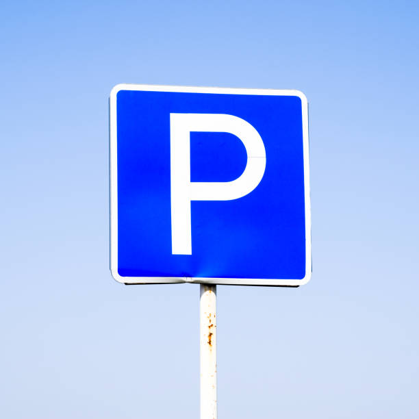 istock Road sign parking. Sign on a blue sky background. 1090146692
