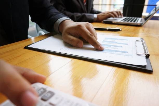 istock Hands of business people analyzing chart Finance managers task. 1090147248