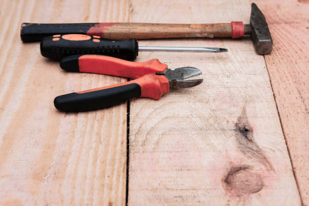 istock Set of vintage hand construction tools on a wooden background . 1090149174