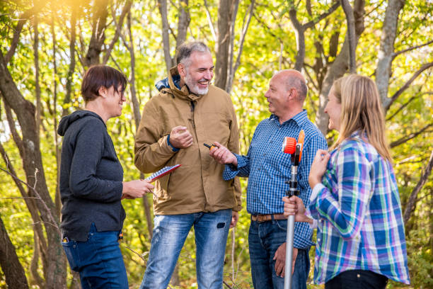 istock Surveyors and Customer Having a Discussion in Nature 1090149958
