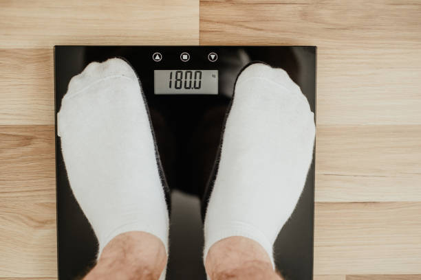 istock Top view of a man on weight. 1090151648