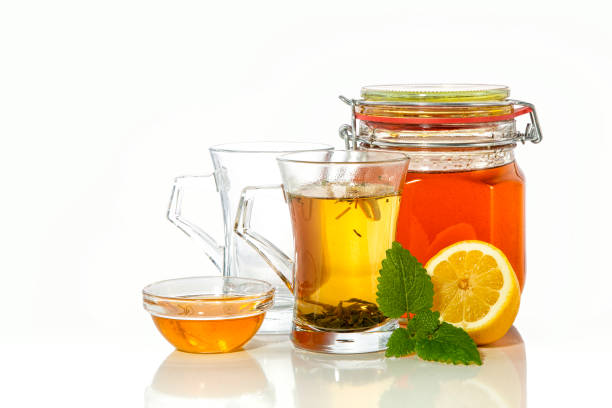 istock green tea with lemon and honey on white background 1090153292