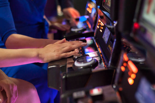 istock Lesbian Couple Playing Slot Machine Together 1090155346