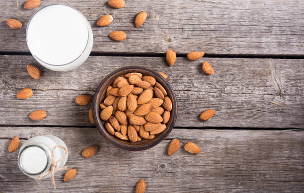 istock Almond milk on wooden table 1090155830