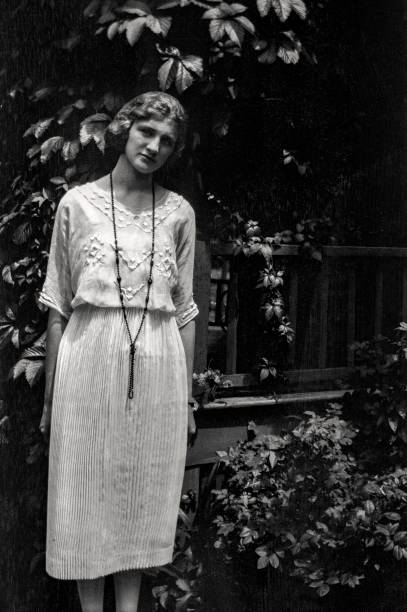 Young Woman In Garden 1921 Black And White Stock Photo - Download ...