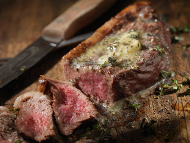 istock Medium Rare Top Sirloin Steak with Herb Garlic Butter 1090164994