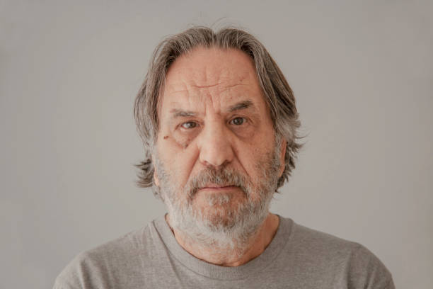istock Portrait elderly man on gray background 1090167062