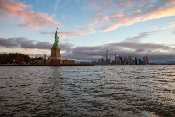 istock Statue of Liberty Sunrise 1090177274