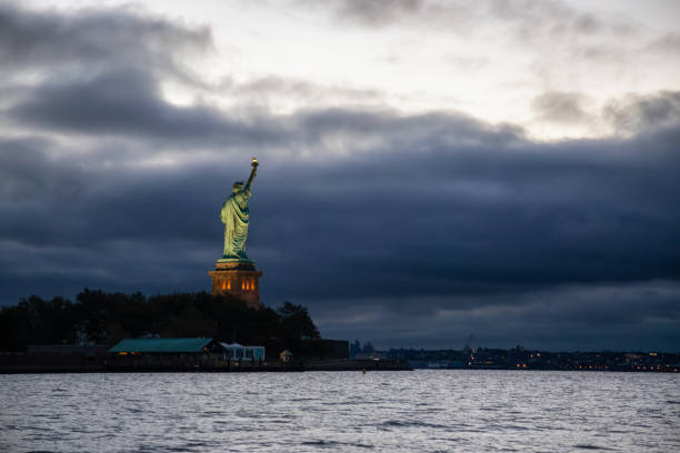 istock Statue of Liberty Sunrise 1090177354