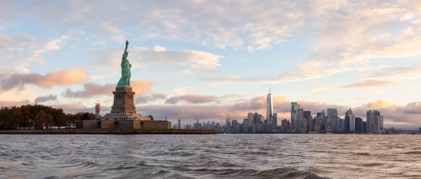 istock Statue of Liberty Sunrise 1090180372