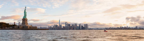 istock Statue of Liberty Sunrise 1090180376