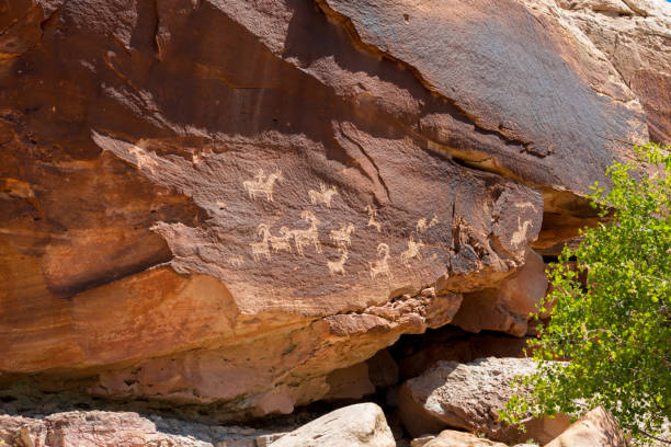 istock petroglyphs painted and carved on stone 1090182918