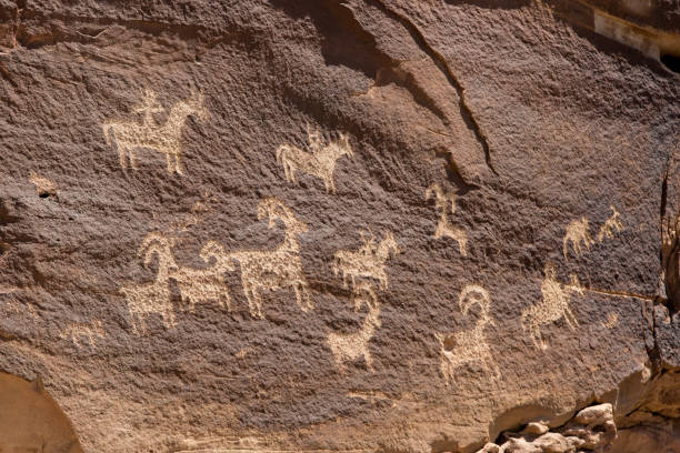 istock petroglyphs painted and carved on stone 1090182952