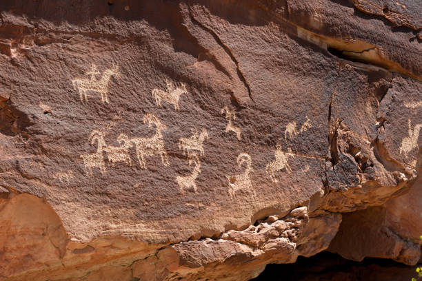 istock petroglyphs painted and carved on stone 1090183044
