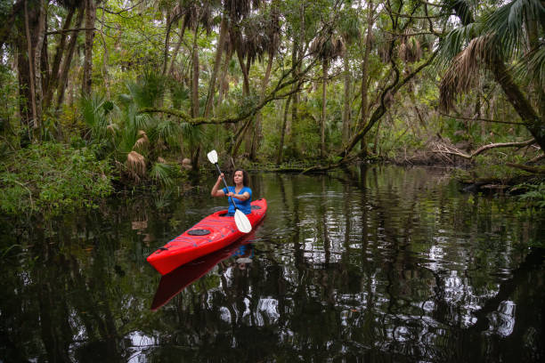 istock Girl Kayaking in a River 1090190130