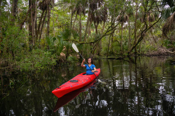 istock Girl Kayaking in a River 1090190168