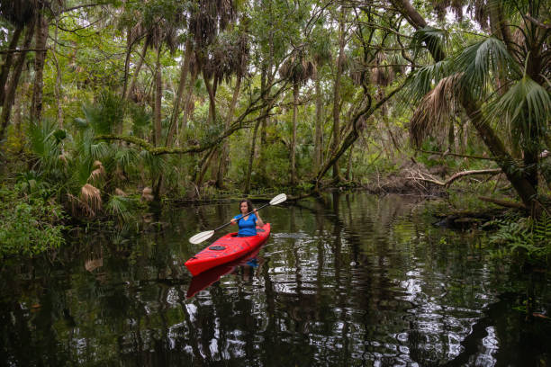 istock Girl Kayaking in a River 1090190198