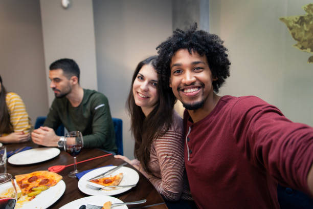 istock Couple Making a Selfie at a Restaurant 1090190250