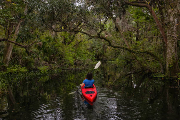 istock Girl Kayaking in a River 1090190314