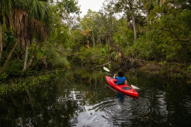 istock Girl Kayaking in a River 1090190380