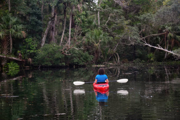 istock Girl Kayaking in a River 1090190478