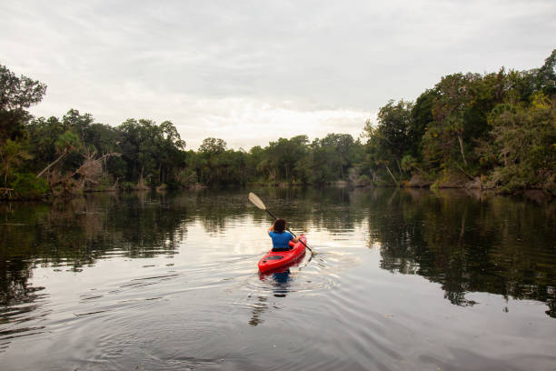 istock Girl Kayaking in a River 1090190482