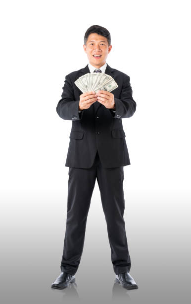 istock Businessman holding money US dollar 1090193002