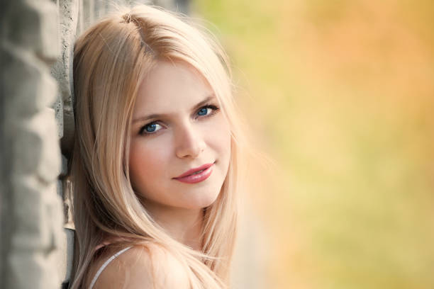 istock blonde face nature summer 1090211690