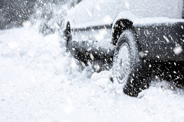 Car tires on winter road