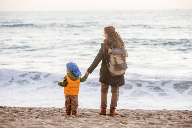 istock Mother with  son visit  Pacific Ocean in California 1090222254