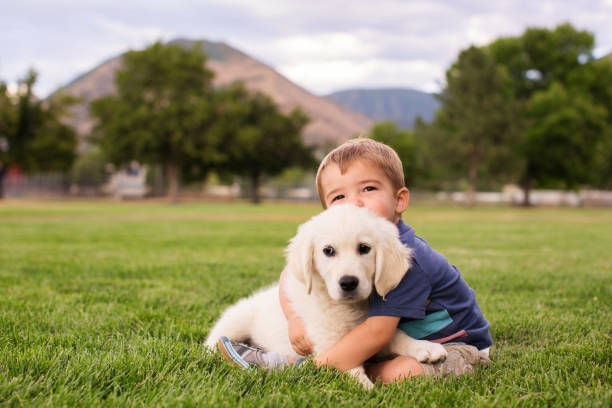 Young Boy with Puppy