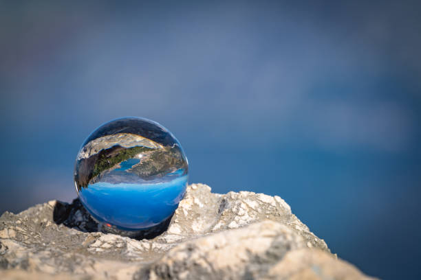 istock Kotor Bay reflected on a glass ball 1090224346