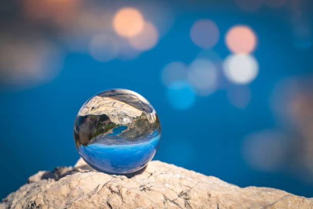 istock Kotor Bay reflected on a glass ball 1090224554
