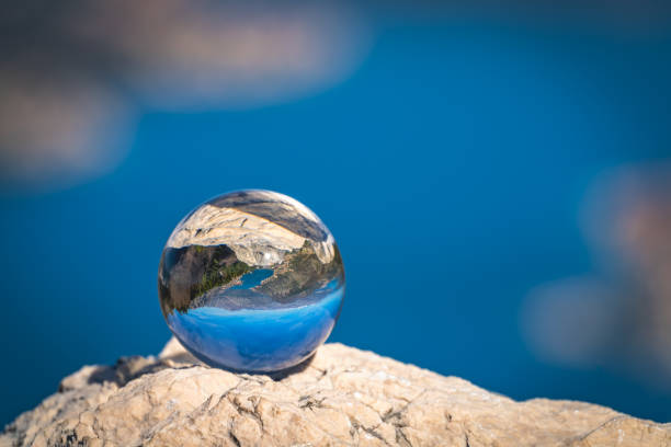 istock Kotor Bay reflected on a glass ball 1090224566