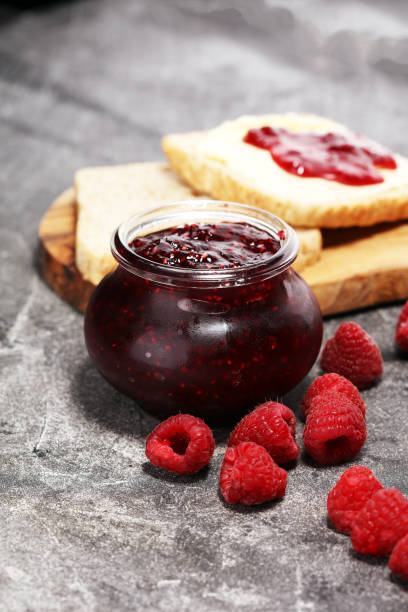 istock raspberry jam with fresh raspberries. marmalade in jar 1090231208